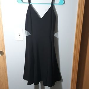 Black dress with black mesh cutouts